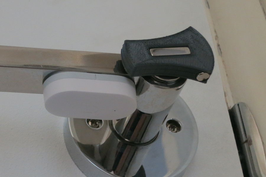 Thumb turn mount attached to an unlocked door