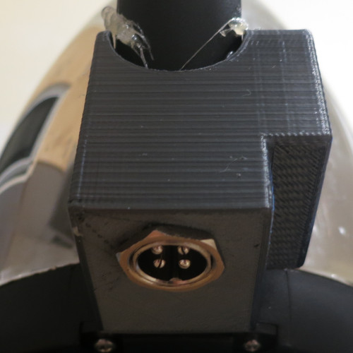 A 3D printed attachment attached the kettle handle as seen from below, showing the connector