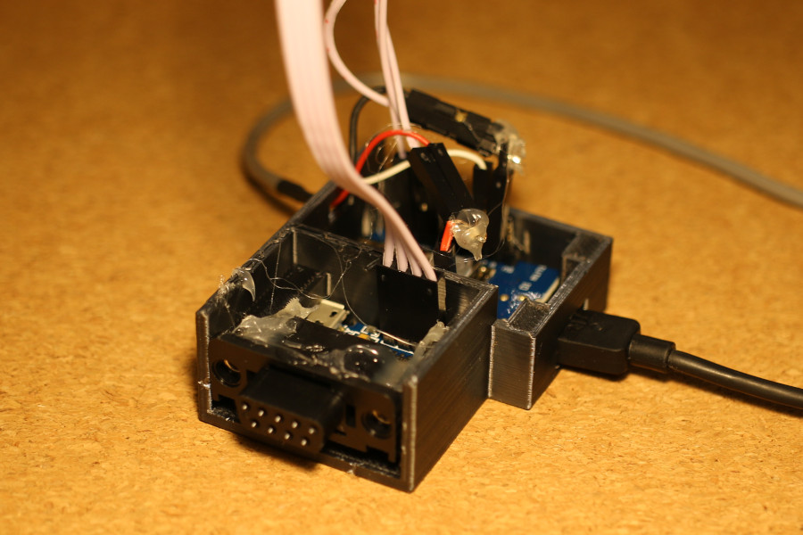 An ESP8266 and RS-232 to TTL UART converter module in a simple 3D-printed case