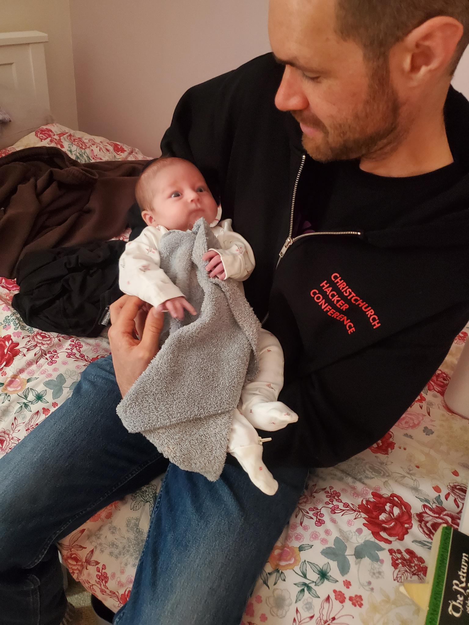 A man holding a baby